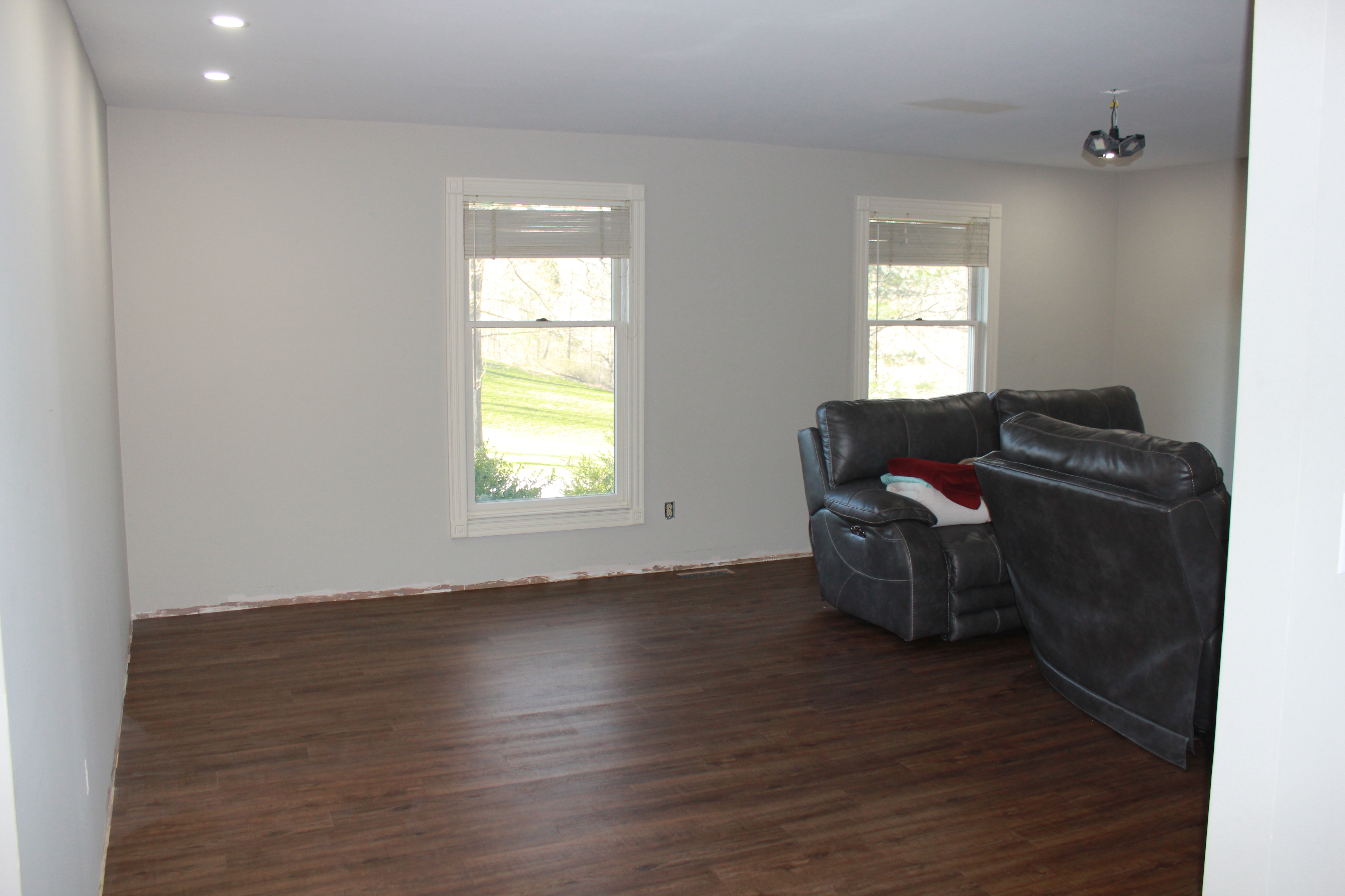 Living room before — empty walls