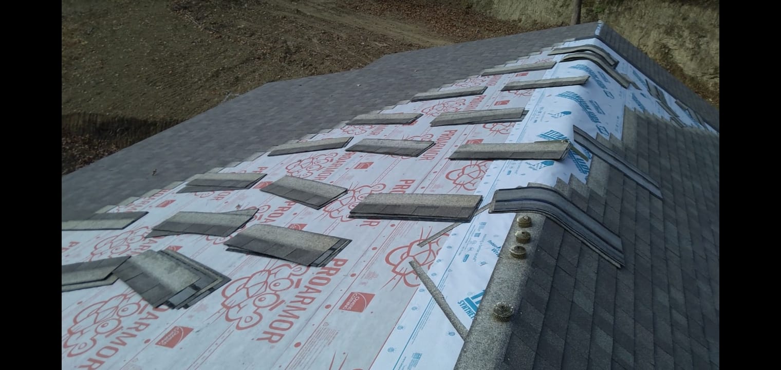 Shingles staged on roof